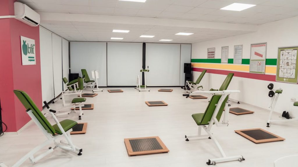 Bright and spacious gym interior featuring modern green exercise machines in Yalova.